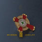 KCCH Court of Honour lapel pin turning slowly, showing the 22k gold coating and hand-laid enamel
