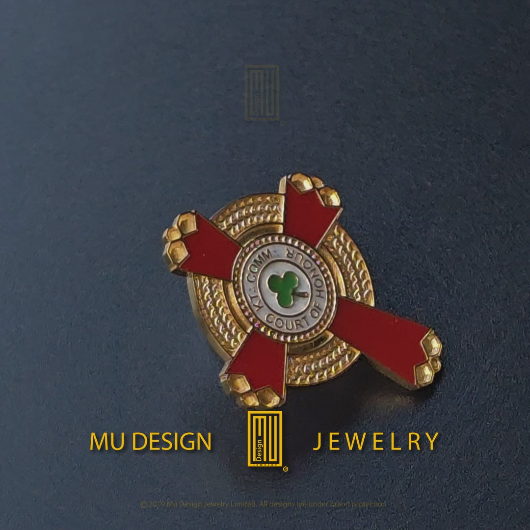 KCCH Court of Honour lapel pin turning slowly, showing the 22k gold coating and hand-laid enamel